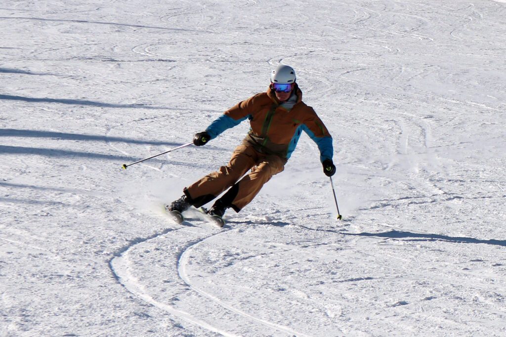 Image of someone skiing down a snow slope.