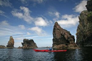 An image of someone sea kayaking through Stacks