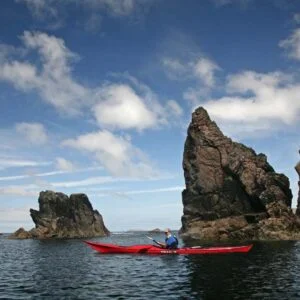 An image of someone sea kayaking through Stacks
